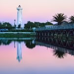 gcff0b8286f42357d2cc7f5a8043b5fa6ee2cbd9d382316a26fe5719e7bf061ace51de4724d4f9678a139b6c16f5de205d3040978b82e721f9eab97e99447fbec 1280 7072385 bridge, building, lighthouse, palm trees, sunrise, architecture, cape town, dawn, diep river, dusk, evening, golden hour, lake, nature, milnerton, milnerton lighthouse, morning, outdoor, reflection, south africa, water, sunset, twilight, woodbridge island